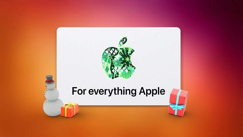A white card with a green apple logo and small presents

Description automatically generated